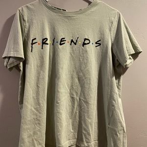 2 green friends shirts $7 each.